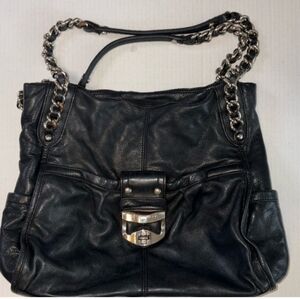 B. Makowsky black leather purse